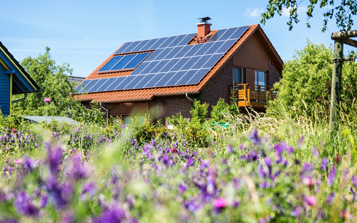 a house with solar panels on the roof